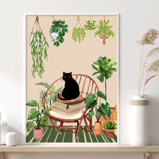 Framed artwork of a black cat on a chair surrounded by plants on a shelf. Canvas & Curio