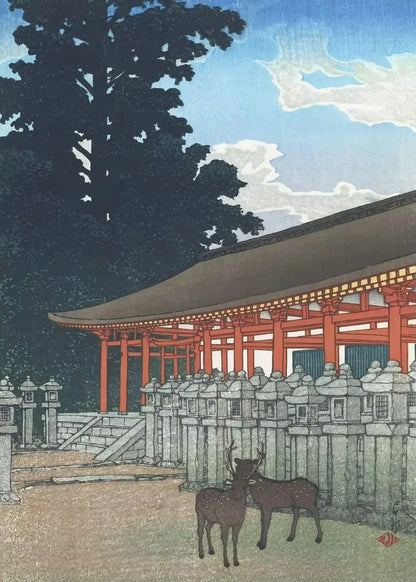 Traditional Japanese architecture with deer in a serene setting