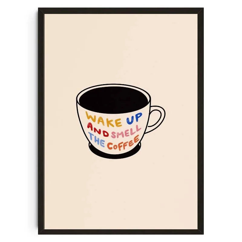 Framed artwork of a coffee cup with 'Wake Up and Smell the Coffee' text on a beige background