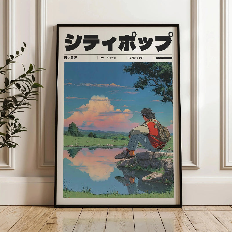 Framed artwork of a person sitting by a lake with Japanese text above