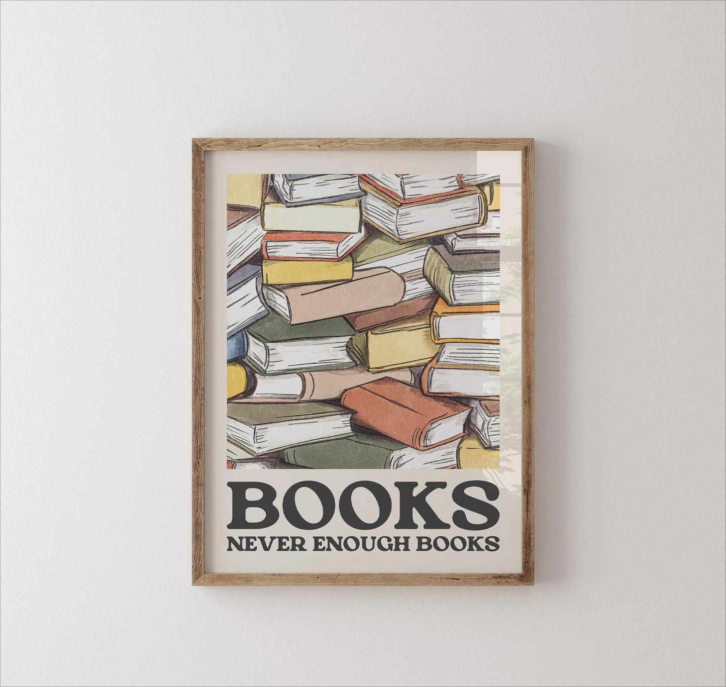 Framed poster with a stack of books and 'Books Never Enough Books' text on a white background