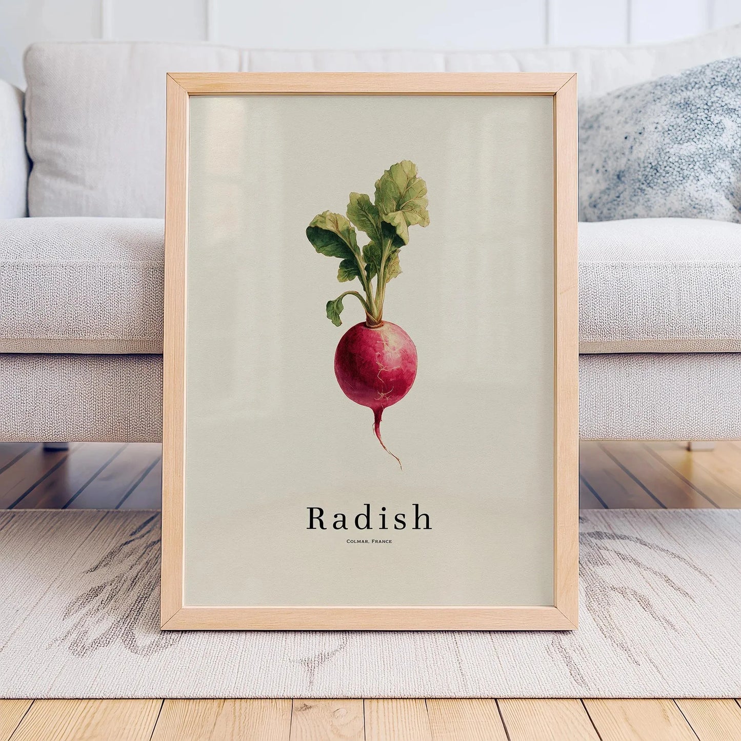Framed print of a radish on a light background, displayed in a living room.