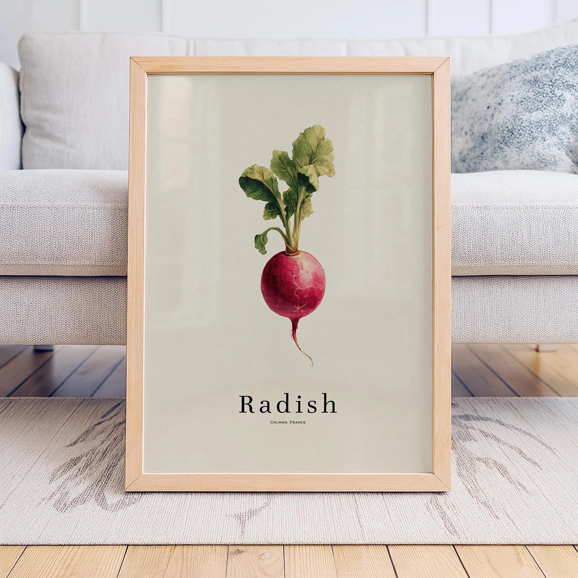 Framed print of a radish on a light background, displayed in a living room.