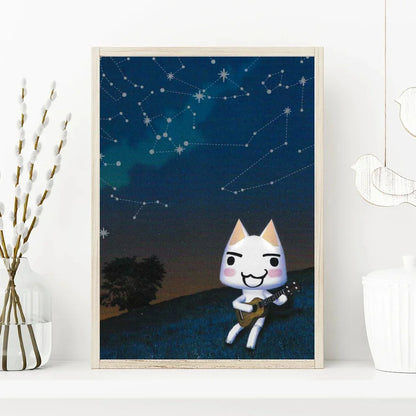 Framed artwork of a cartoon cat playing guitar under a starry sky.