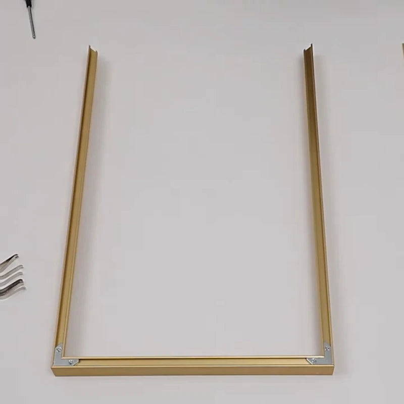 Gold metal frame on a white background