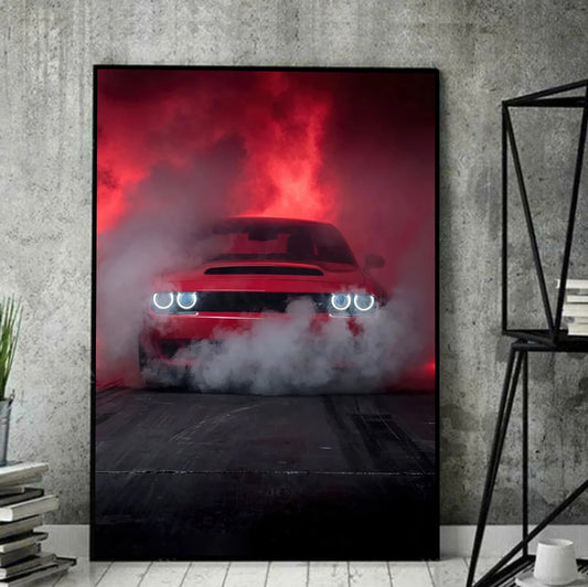 Framed poster of a red car with smoke effects on a concrete wall. Canvas & Curio