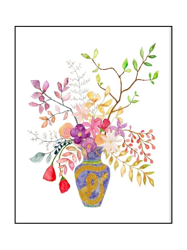 Colorful floral arrangement in a vase on a white background