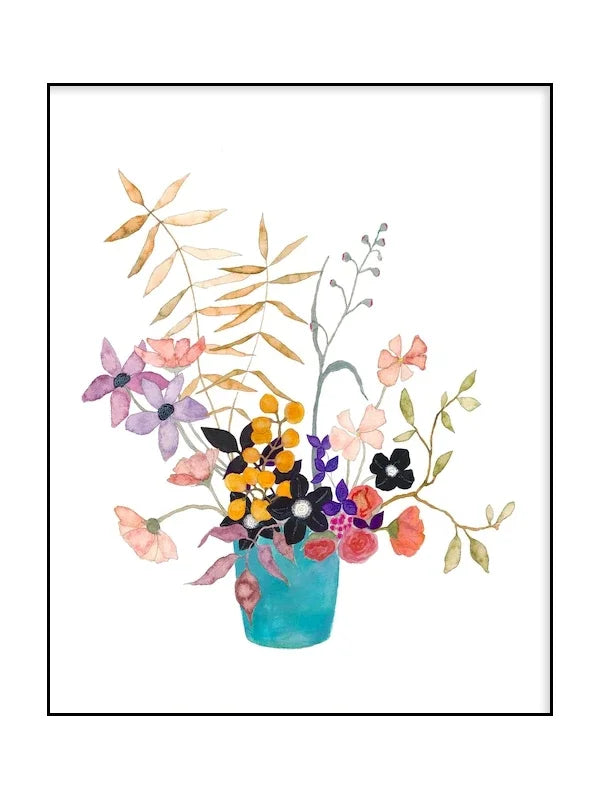 Colorful floral arrangement in a blue vase on a white background