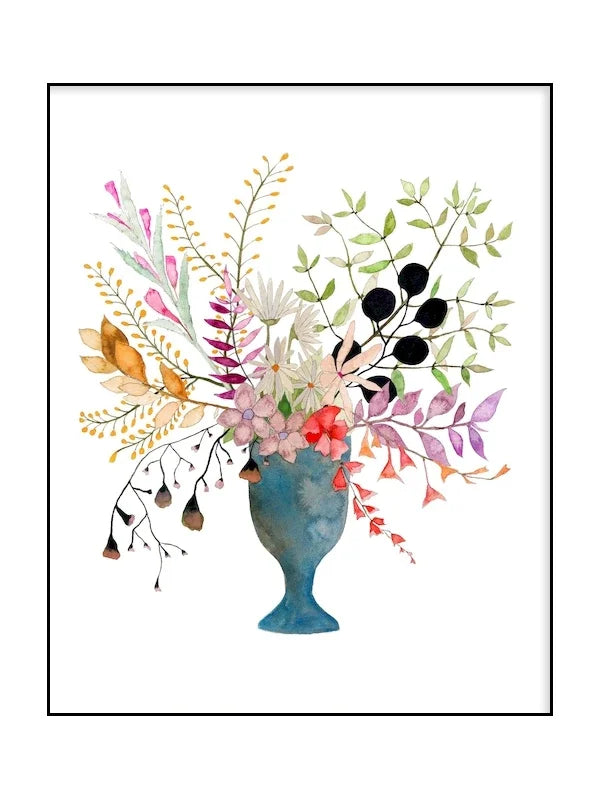 Colorful floral arrangement in a blue vase on a white background