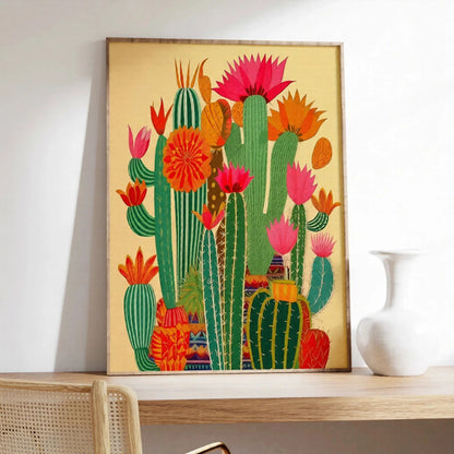 Framed colorful cactus artwork on a wall